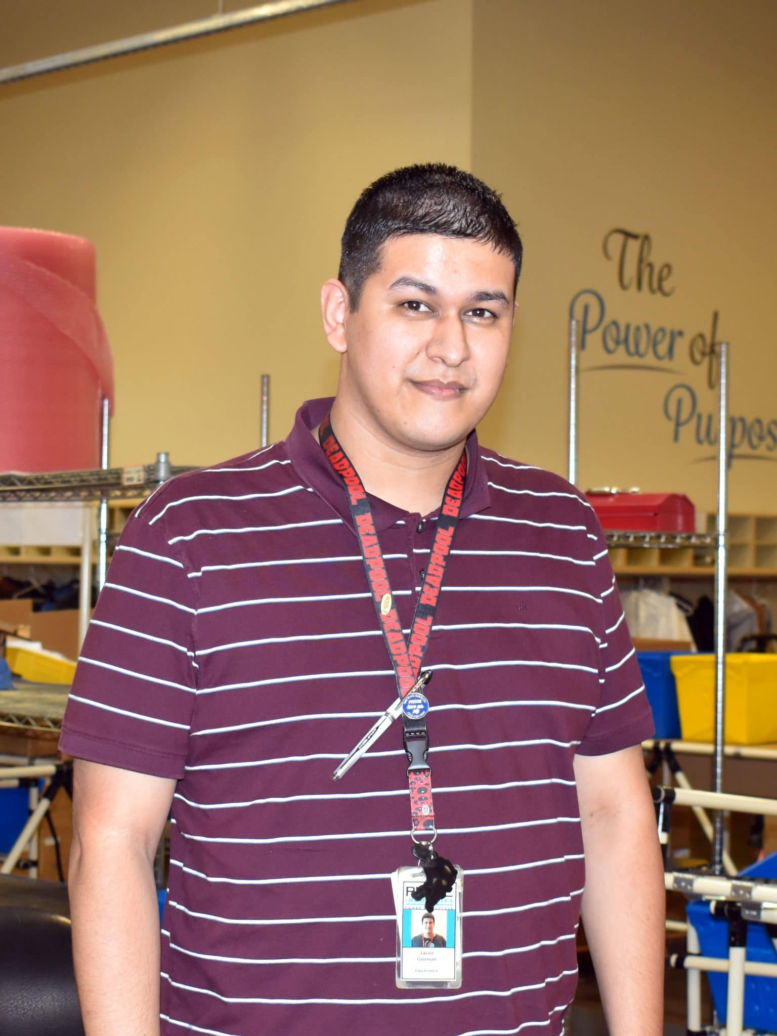 Javier Guzman stands on the PRIDE Industries production floor.