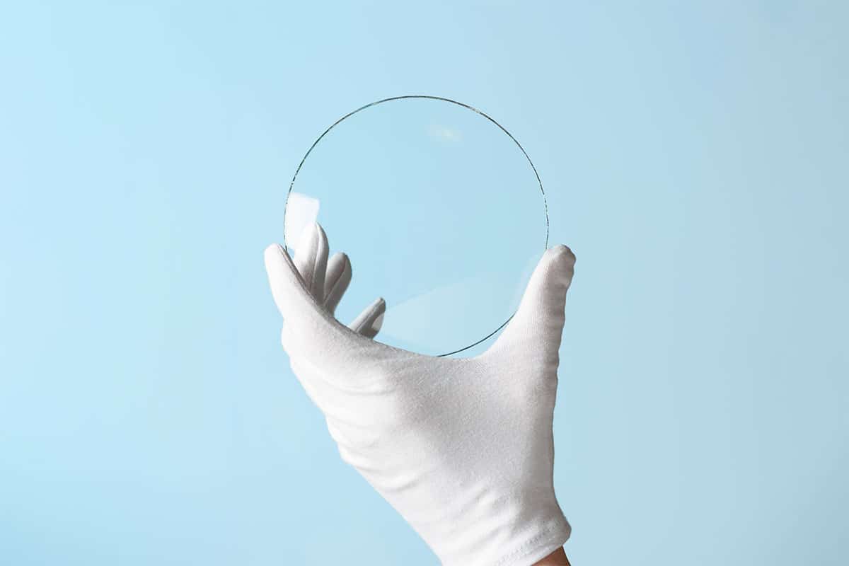 hand holding glass ball