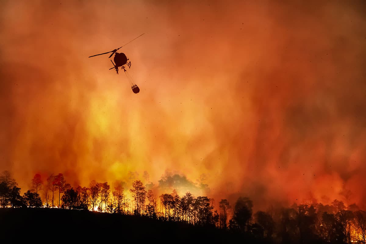 Smoke-filled air with helicopter