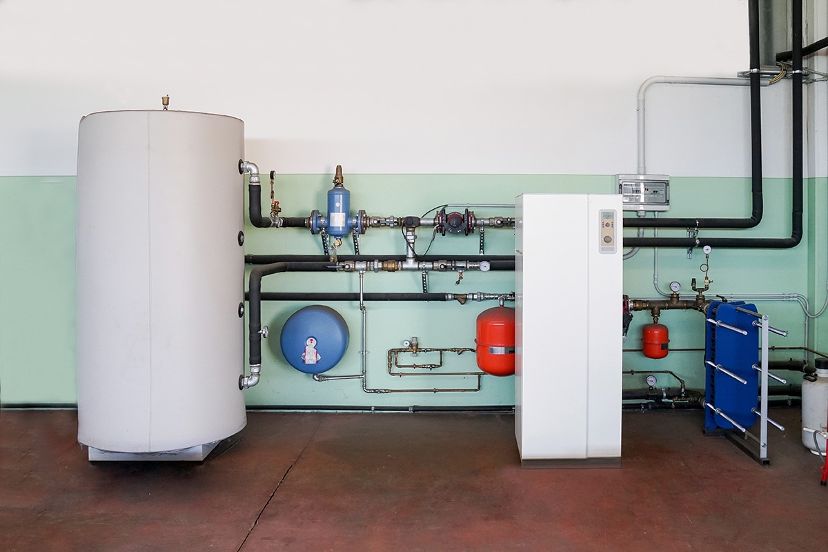 A geothermal heat pump for a commercial building, mounted next to a wall