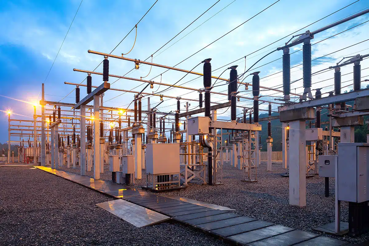 A close-up of an electrical substation, with multiple transmission lines